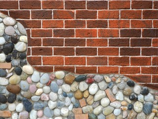 Two style of wall between brick and round stones