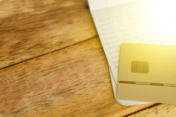 Passbooks bank and credit cards on wood.concept of financial and
