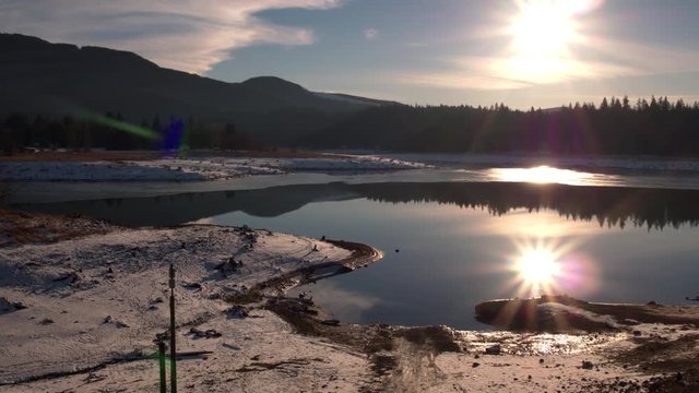 Mountain Lake Sun Reflection aerial