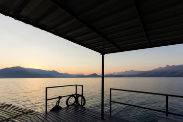 Obraz premium Wooden Bench By Lake