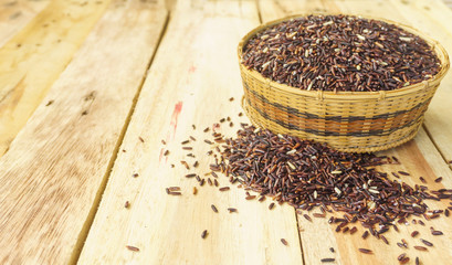 grain of rice,rice berry on wood background