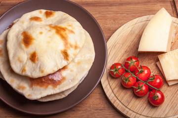 Cheese pita and tomatoes cherry
