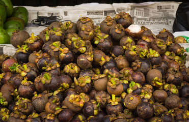 A heap of ripe mangosteens sold in traditonal market in Bogor Indonesia