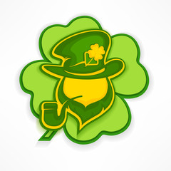 Leprechaun with pipe on green