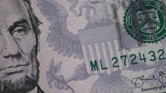 Rotating Five Dollar Bill Motion