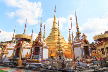 Golden pagoda at Wat Phra Borommathat public temple in Thailand