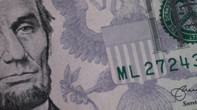 Rotating Five Dollar Bill Motion