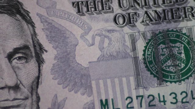 Rotating Five Dollar Bill Motion
