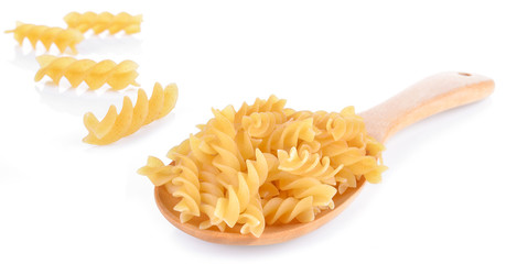 Fototapeta premium yellow pieces of macaroni isolated on white background