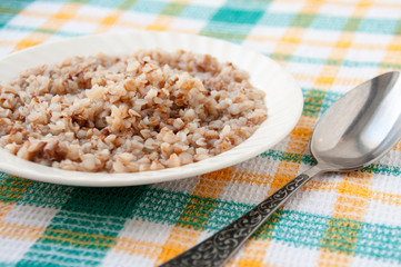 Buckwheat porridge for breakfast in a plate