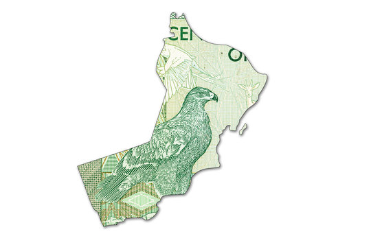 100 omani baisa bank note in shape of oman