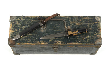 Old knife since the Second World War on a white background on th