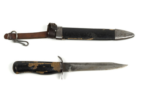 Old knife since the Second World War on a white background