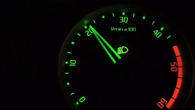 High speed emergency lights. Speedometer, tachometer sports car. Cyclometer. Car instrument panel, showing rpm and high speed acceleration. Speedometer, cyclometer, tachometer sports car. Car instrume