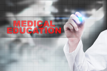 Medical doctor drawing medical education on virtual screen.