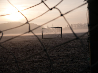 Beautiful foggy soccer pitch