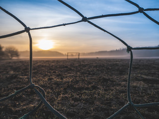 Beautiful foggy soccer pitch