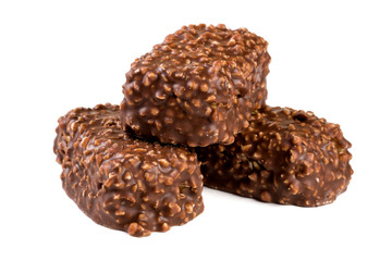 chocolate candy with nuts isolated on white background