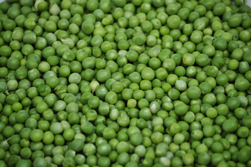 Fototapeta na wymiar Nuts young pea seeds, green, peeled bulk