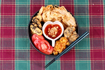 Deep fried dessert of corn ,taro ,nian gao and banana .