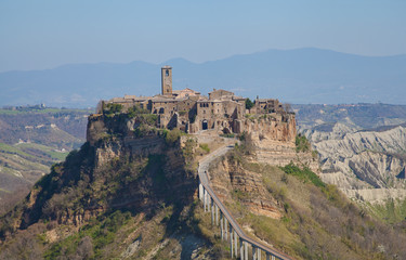 Fototapeta na wymiar View of Civita di Bagnoregio past midday (Viterbo, Italy)