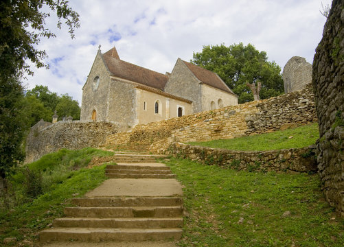 MONPAZIER, FRANCE - SEPTEMBER 10, 2015: Main square in the bastide of Monpazier, Aquitaine, Dordogne, France, September 2015
