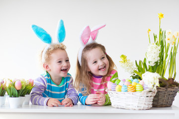 Kids with bunny ears on Easter egg hunt