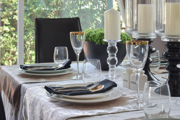 elegant table set in modern style dining room interior