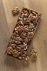 Walnuts in old wooden dish