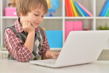 Boy using laptop 