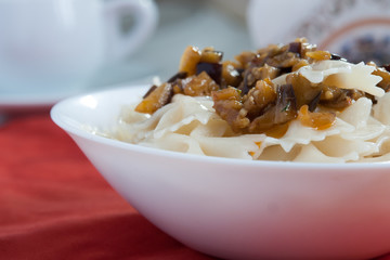 Farfalle Pasta - with eggplants on white bowl