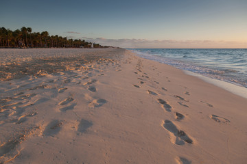 Early morning footprints on a Caribbean beach near Playa Del Carmen on the Yucatán Peninsula