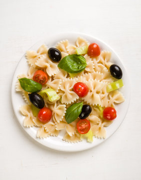 farfalle salad on white table
