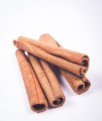 Cinnamon sticks isolated on white background.