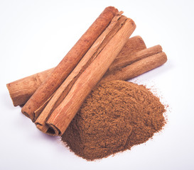 Cinnamon sticks isolated on white background.