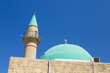 A beautiful Sinan Basha Mosque with green dome in the old town o - obrazy, fototapety, plakaty
