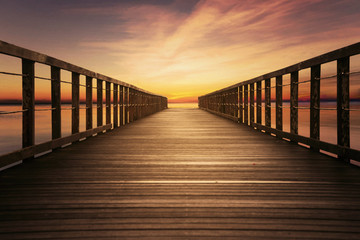 Fototapeta na wymiar Wooden pier with beautiful sky