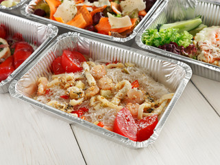 Healthy food take away, on wood background