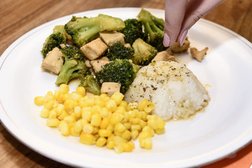 Cooking and serving of broccoli with chicken breast