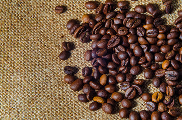 coffee beans on burlap background