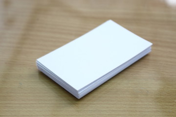 Fototapeta premium White business card on the desk.
