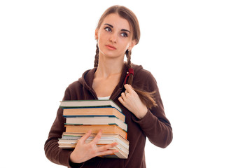 tired young students girl with books in her hands isolated on white background