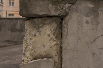 Old Damaged block Wall With Cracked White Plaster Layer