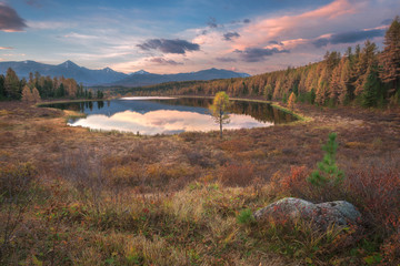 Mirror Surface Lake Early Sunset Wide Angle Autumn Landscape With Mountain Range On Background