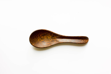 Isolated wooden spoon on white background