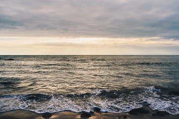 Sunset beach water sky and light