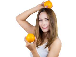 Asian Woman smiling And holding orange on two hand, isolated on white background. Healthy Food concept.