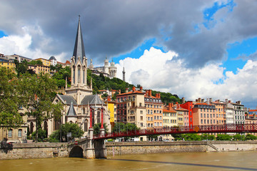 Obraz premium St. Georges church and bridge over Saone river in Lyon, France