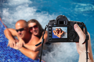 Couple in jacuzzi. Reflex camera