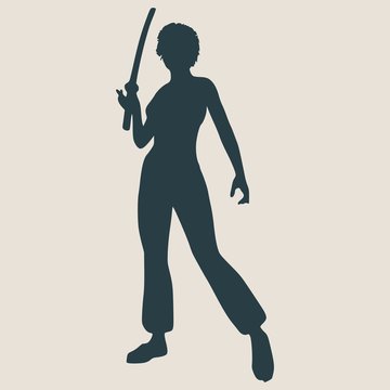 Karate martial art silhouette of woman in sword fight karate pose